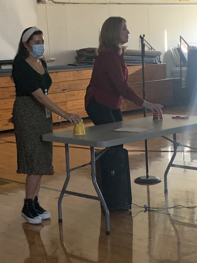 Miss Cohen and Mrs. Knitel leading the assembly