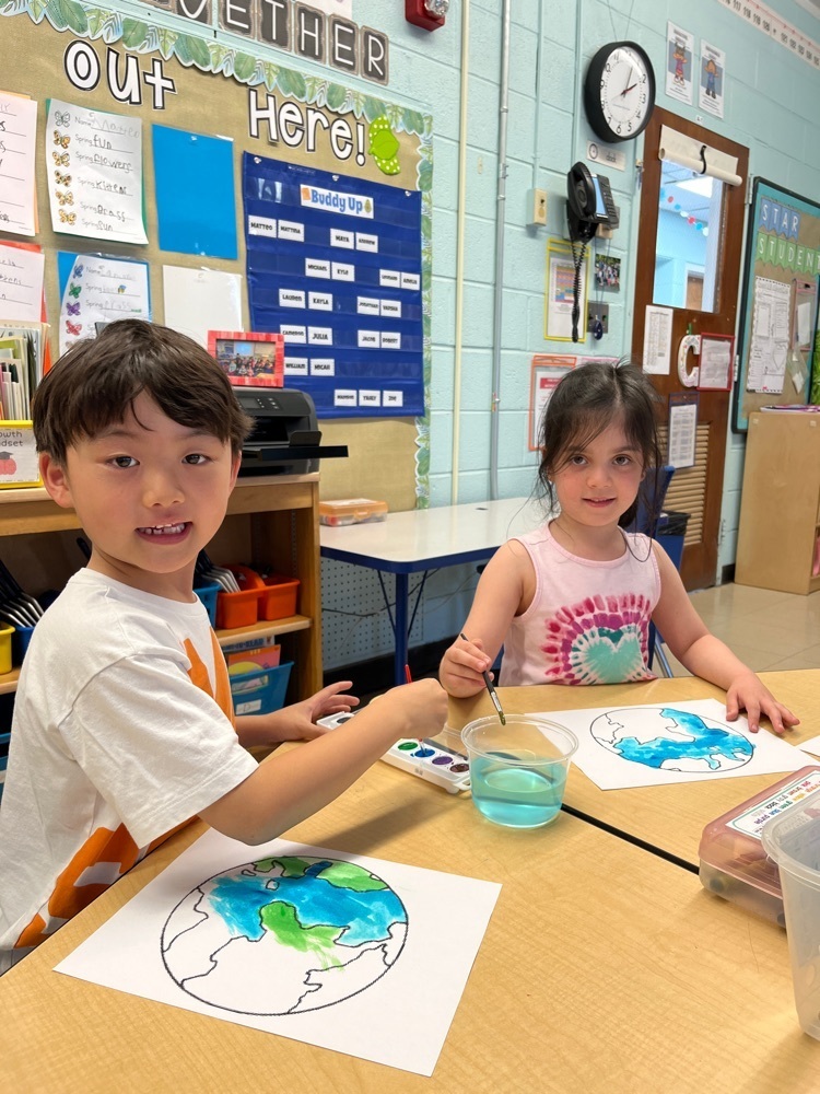 students painting Earth